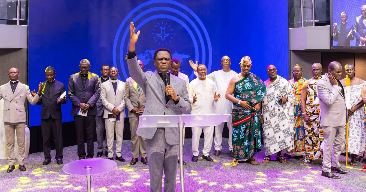 Apostle Eric Nyamekye ministers at the dedication service, flanked by ministers and traditional leaders